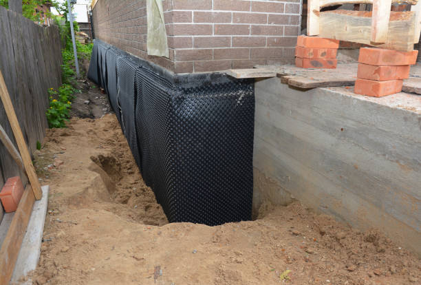Happy homeowners after waterproofing job in Westchester